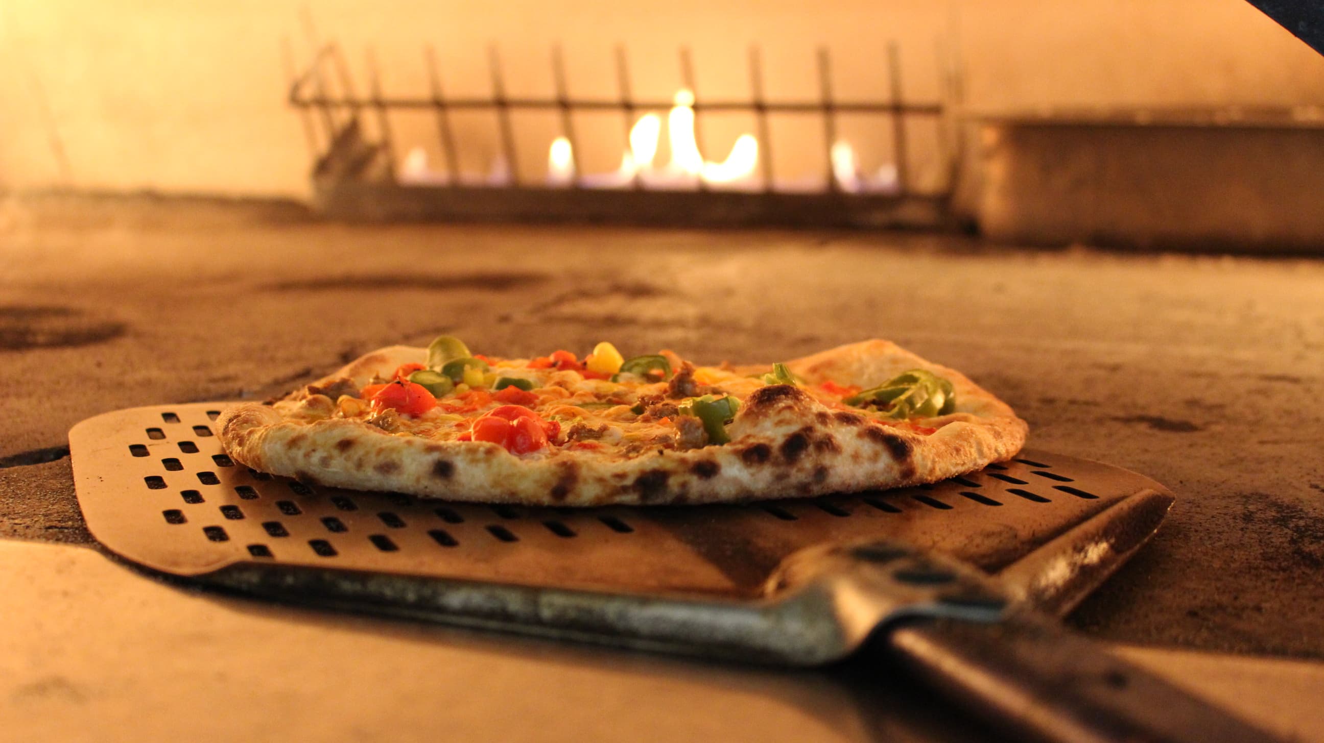 Wood-fired pizza from Harvest Pizza, part of Grow Restaurants